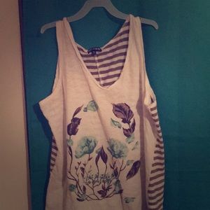 A white grey skull tank with slit in back.